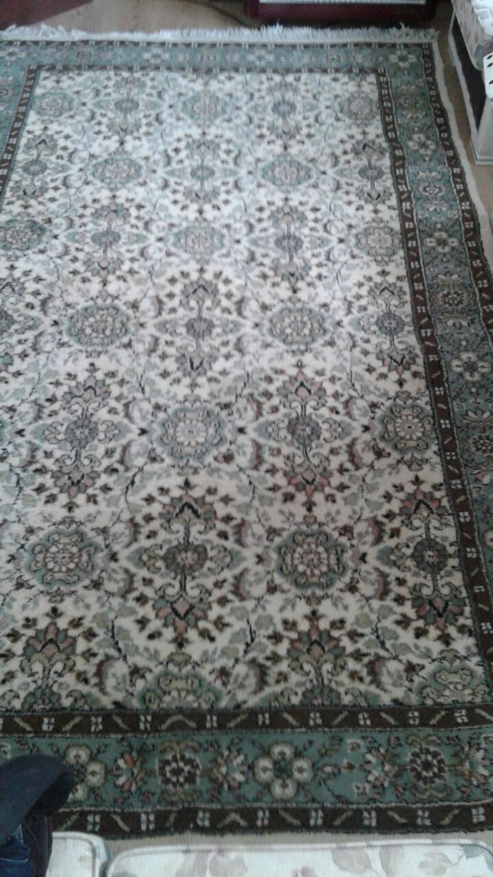 El dokuması kök boya yün ısparta halısı